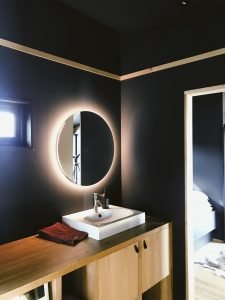 Bathroom renovations sudbury Wood vanity and light on mirror Buckingham Designs